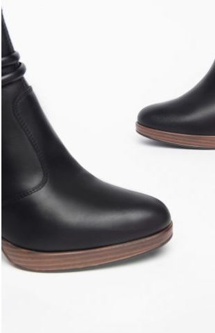 TRONCHETTI PELLE NERA APPLICAZIONI