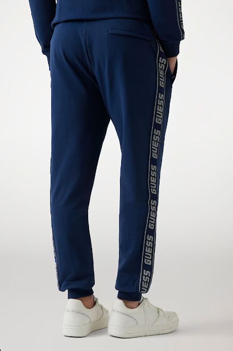 PANTALONI JOGGER GUESS BANDE LATERALI LOGO BLU