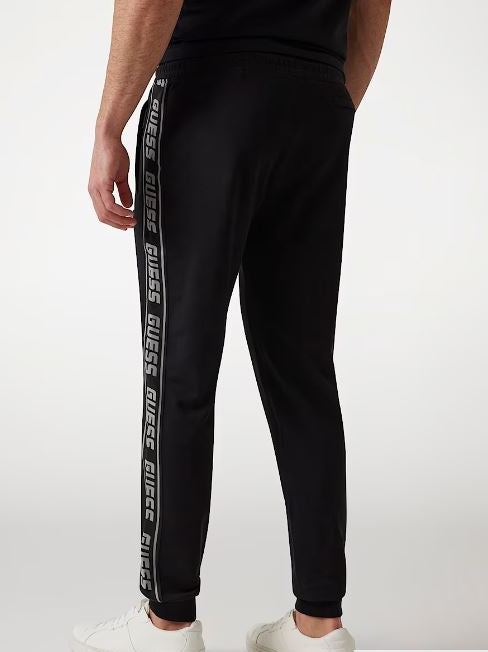 PANTALONI JOGGER GUESS BANDE LATERALI LOGO NERO