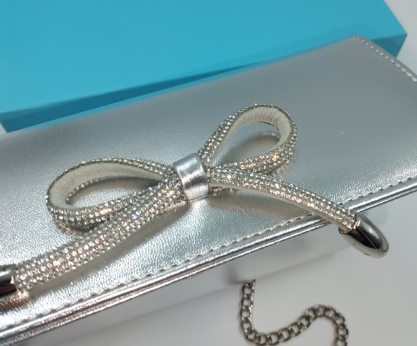 POCHETTE  ARGENTO CON FIOCCO STRASS